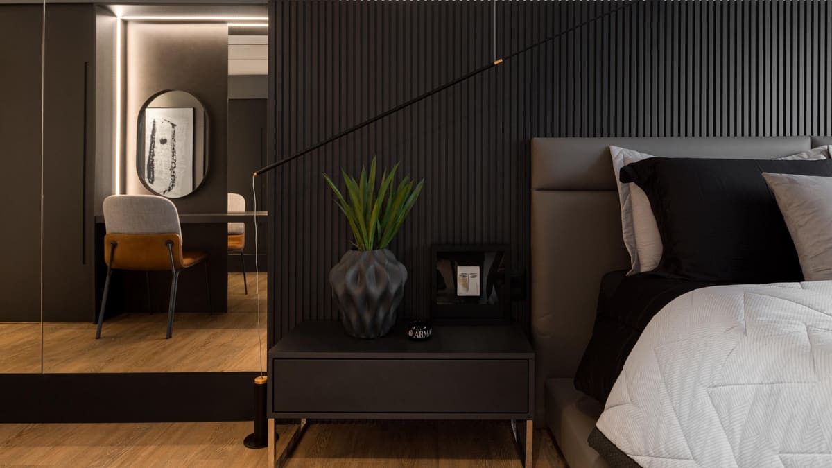 Bedroom with a black slatted wall and a built-in desk with an oval mirror beyond